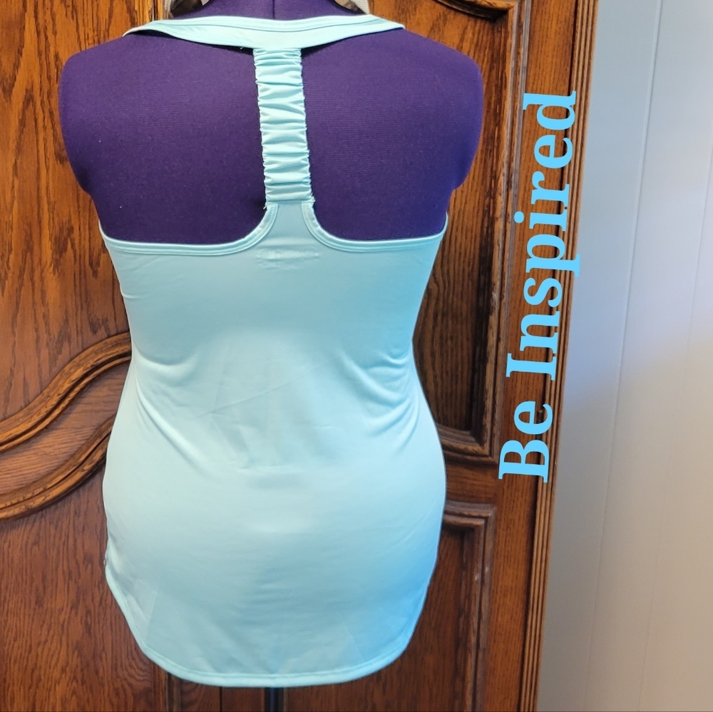 Be Inspired woman's turquoise racerback stretchy tank top size: M